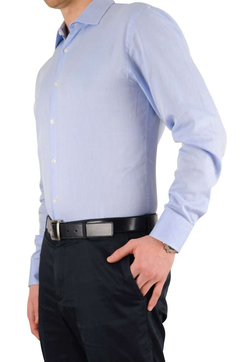 Man with neatly tucked shirt using Tuck-n-Stay