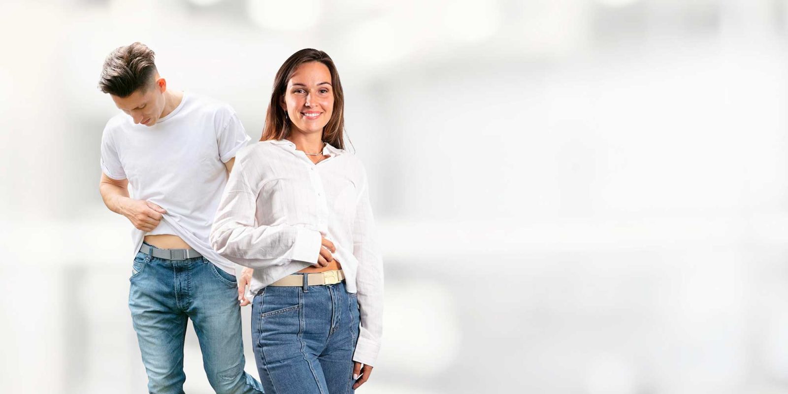 Man and Woman happily wearing beltaway belts