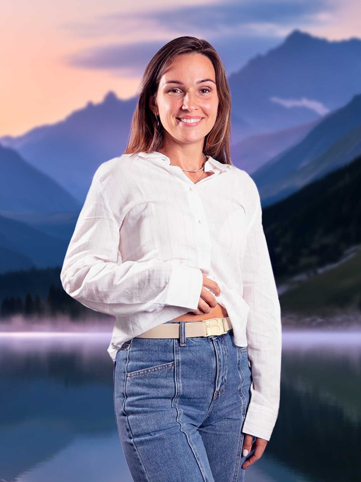 Woman wearing a beltaway belt looking happy in front of a lake